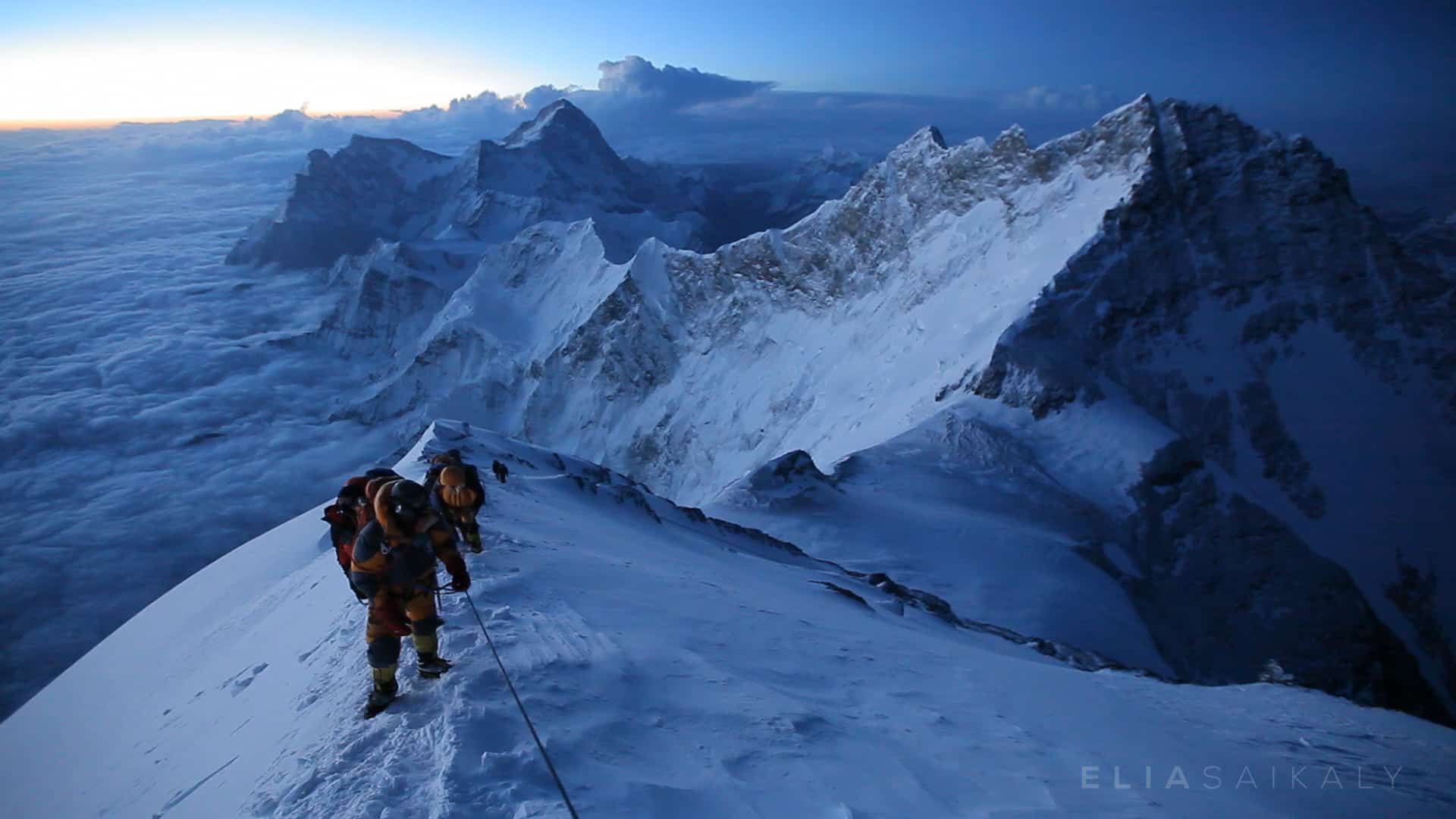 Climbers on the balcony of Mt Everest at first light ...
